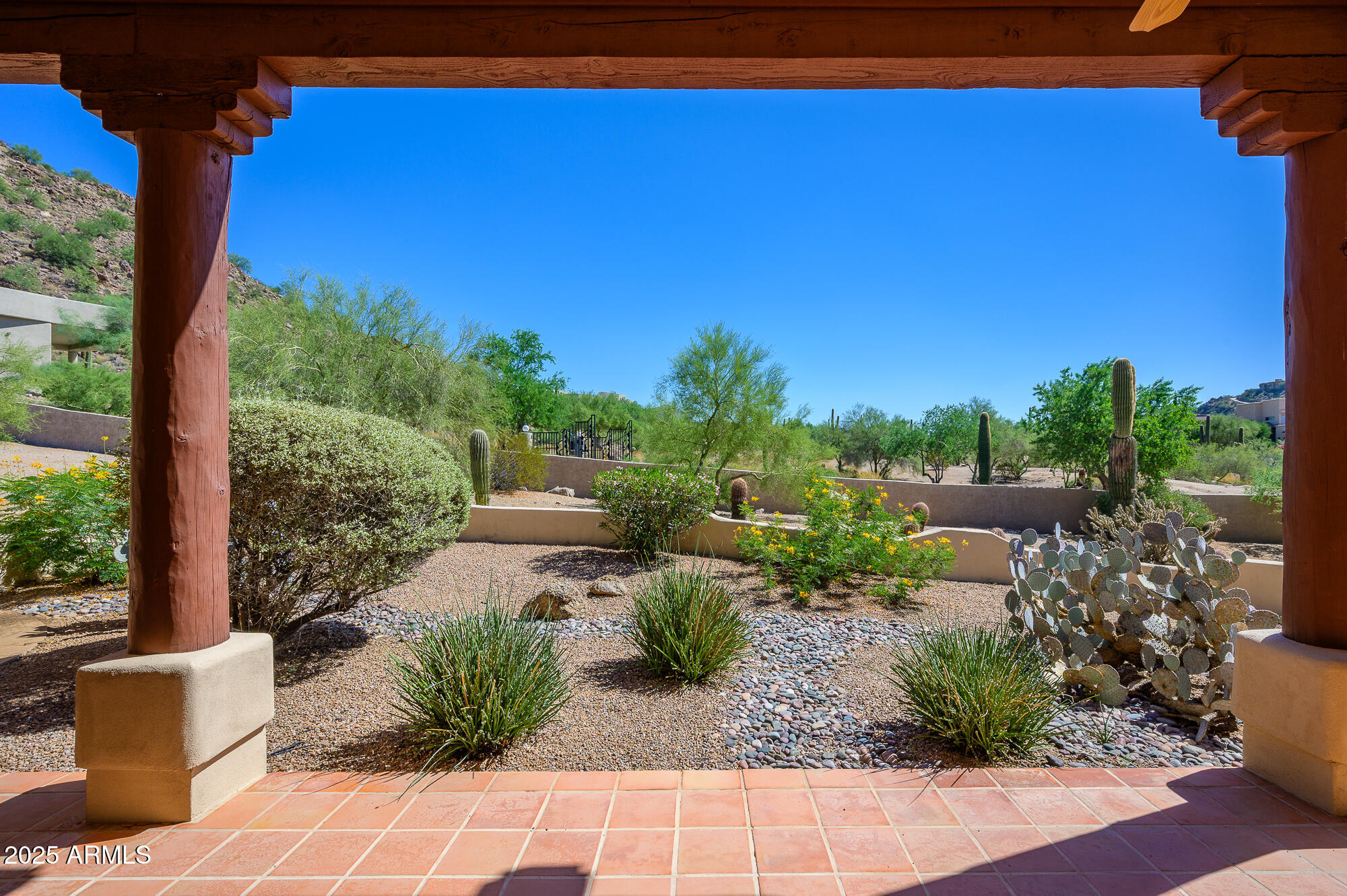 8540 East McDowell Road, Unit 29 Mesa, AZ 85207 - Photo 49 of 59 a view of a chairs and table in patio