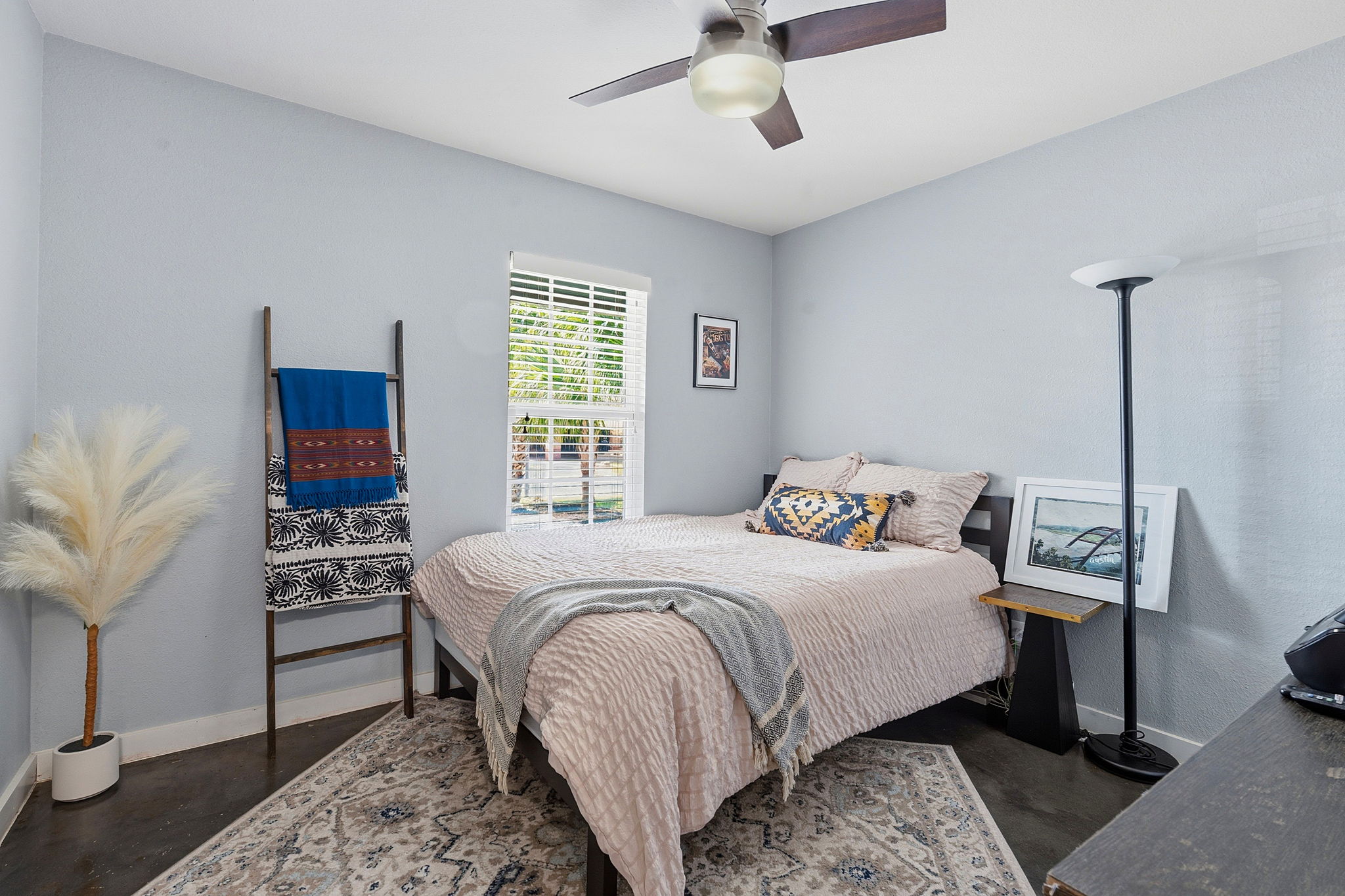 805 Nile Street Austin, TX 78702 - Photo 13 of 22 a bedroom with a bed and a window