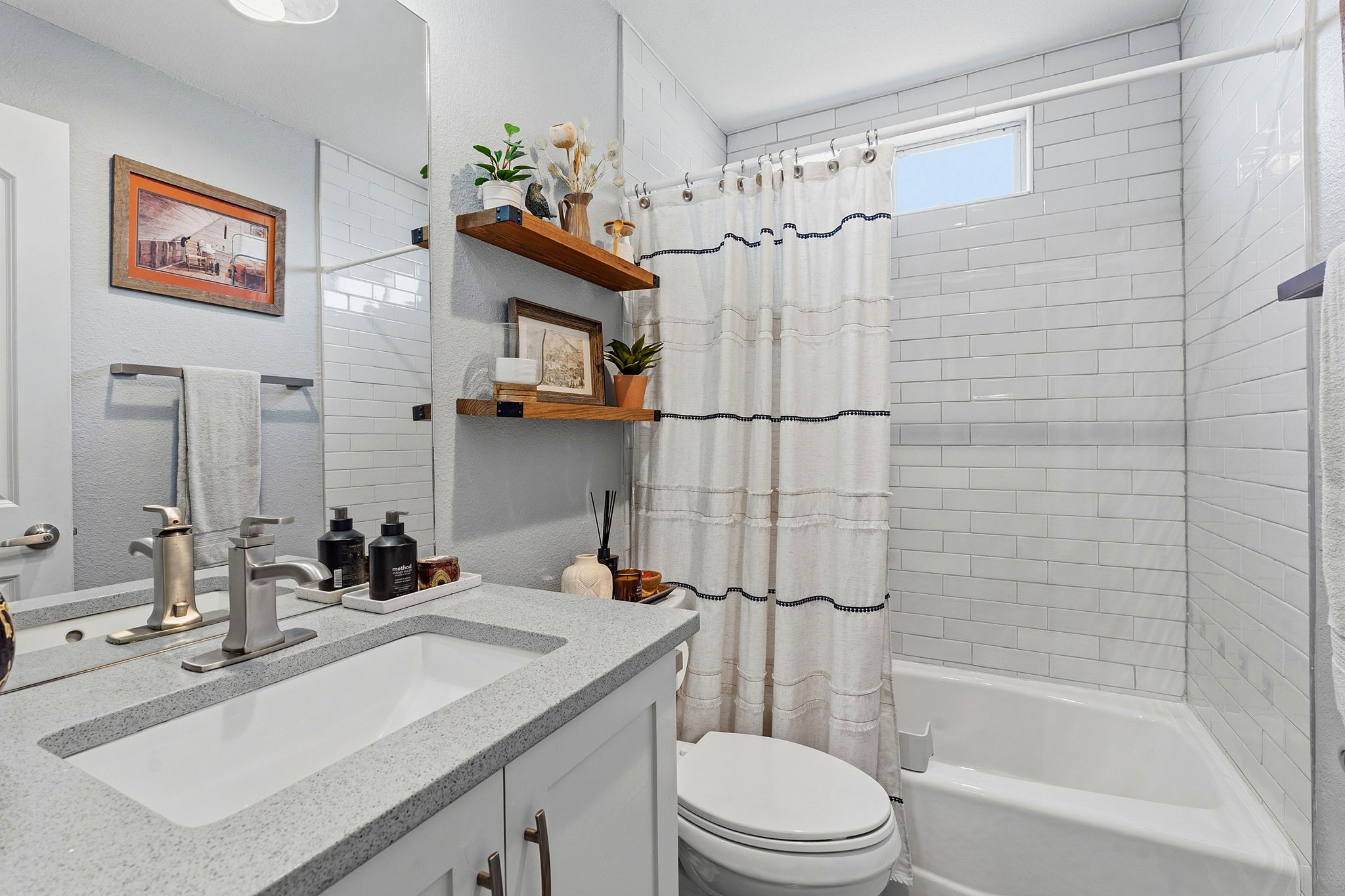 805 Nile Street Austin, TX 78702 - Photo 14 of 22 a bathroom with a sink a toilet and shower