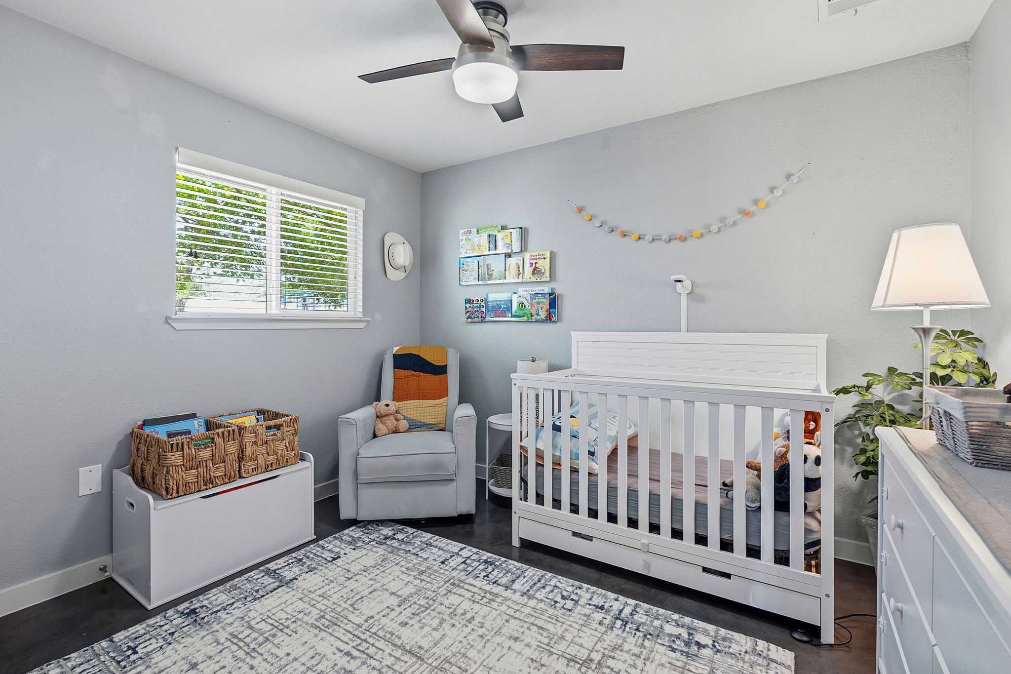 805 Nile Street Austin, TX 78702 - Photo 15 of 22 a bedroom with furniture and a window