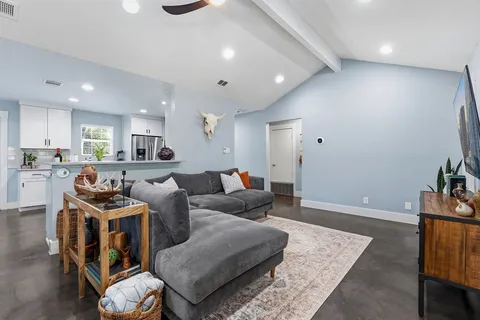 a living room with furniture and a couch