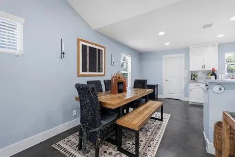 a view of a dining room with furniture