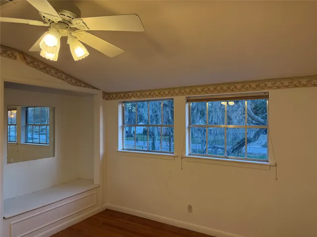 a view of a room with a large window