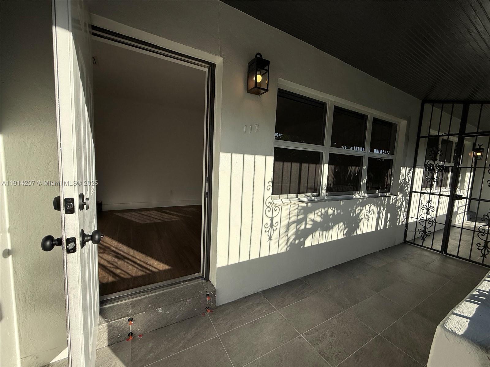 117 Northwest 118th Street, Unit 117 Miami, FL 33168 - Photo 3 of 20 a view of outdoor space