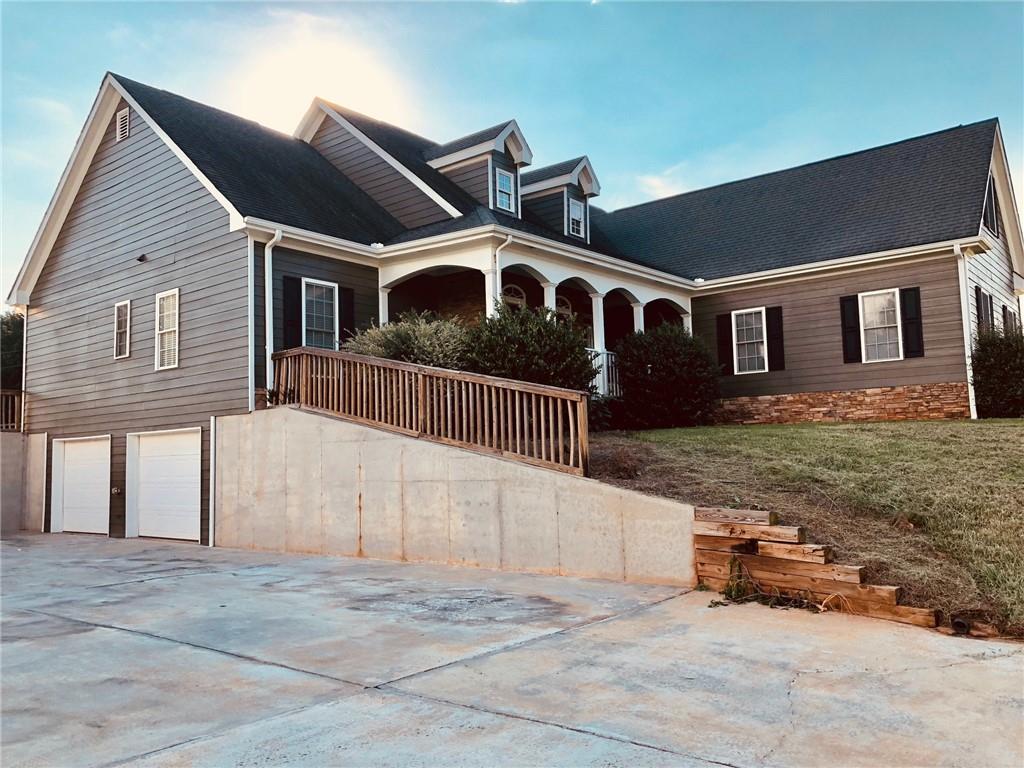 478 Ebenezer Church Road Jefferson, GA 30549 - Photo 1 of 1 a front view of a house with a yard