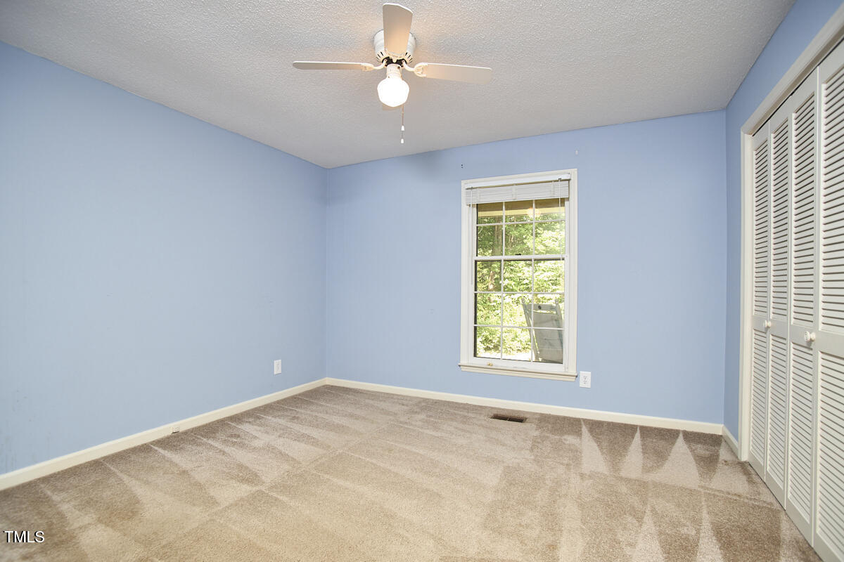 5319 Memory Lane Durham, NC 27712 - Photo 21 of 29 a view of an empty room with a window