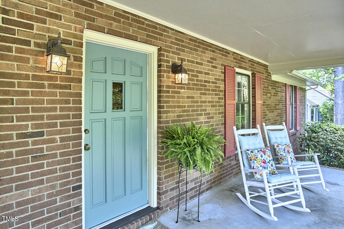 5319 Memory Lane Durham, NC 27712 - Photo 3 of 29 a view of chair and table in the patio