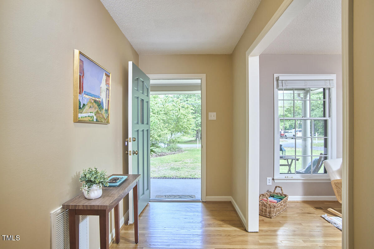 5319 Memory Lane Durham, NC 27712 - Photo 4 of 29 a living room with furniture and a window