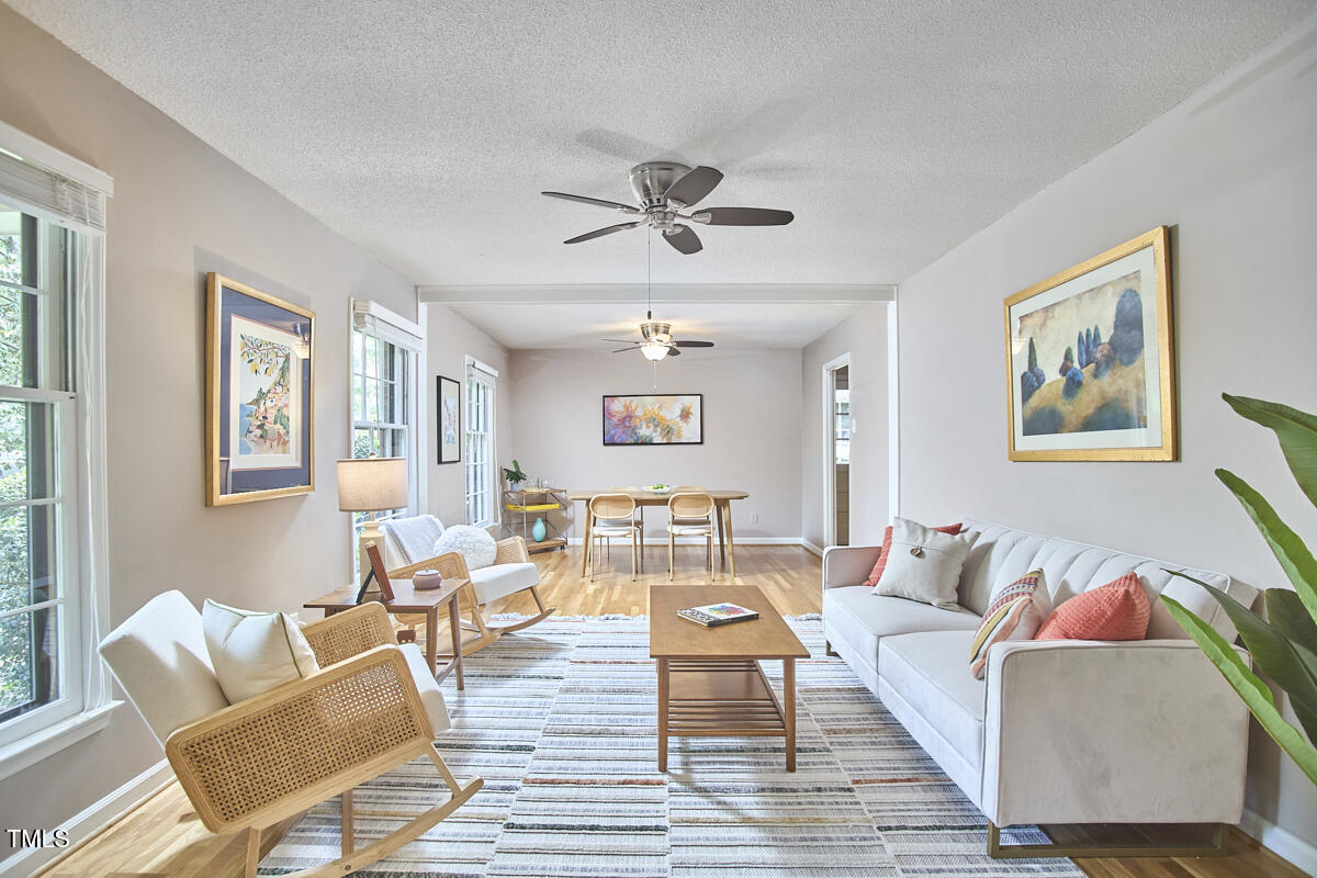 5319 Memory Lane Durham, NC 27712 - Photo 5 of 29 a living room with furniture or couch and a window