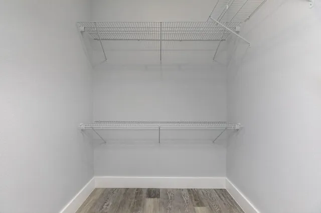 a view of a room with racks on the wall