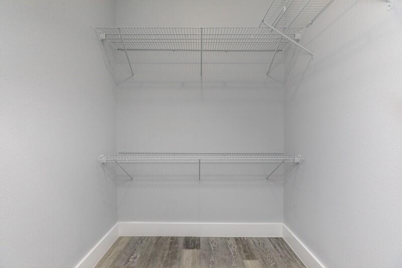 4516 Hermosa Road Crestview, FL 32539 - Photo 19 of 35 a view of a room with racks on the wall