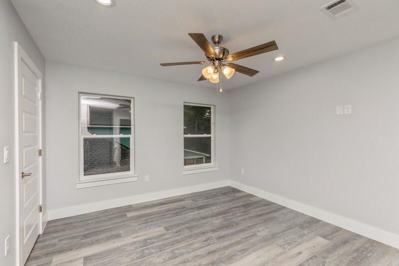 4516 Hermosa Road Crestview, FL 32539 - Photo 20 of 35 a view of empty room with wooden floor and fan