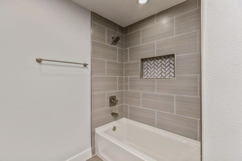 4516 Hermosa Road Crestview, FL 32539 - Photo 22 of 35 a bathroom with a bathtub