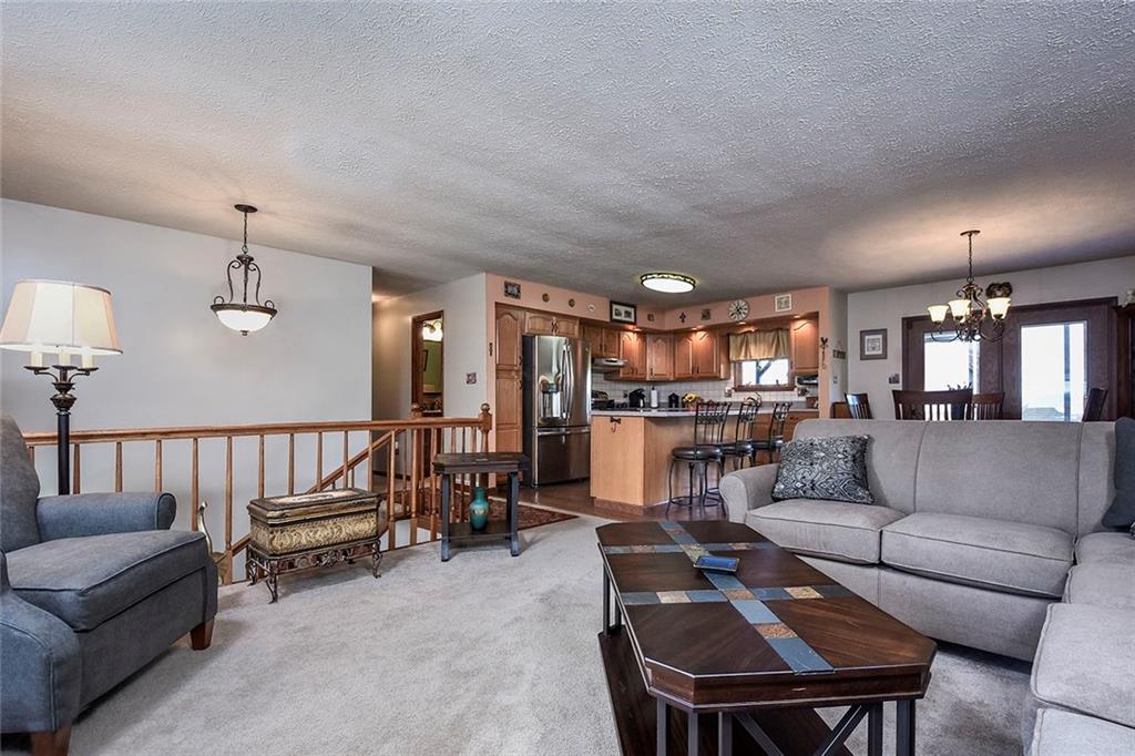 201 County Line Road Bridgeville, PA 15017 - Photo 7 of 25 Open floor plan! Living room leads to dining area and kitchen.