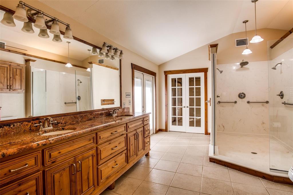 9470 S Highway Pilot Point, TX 76258 - Photo 11 of 26 a bathroom with a shower sink and mirror