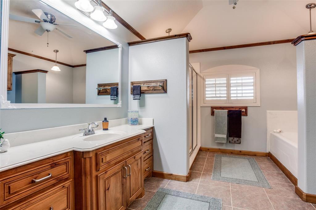 9470 S Highway Pilot Point, TX 76258 - Photo 15 of 26 a bathroom with a sink and a mirror