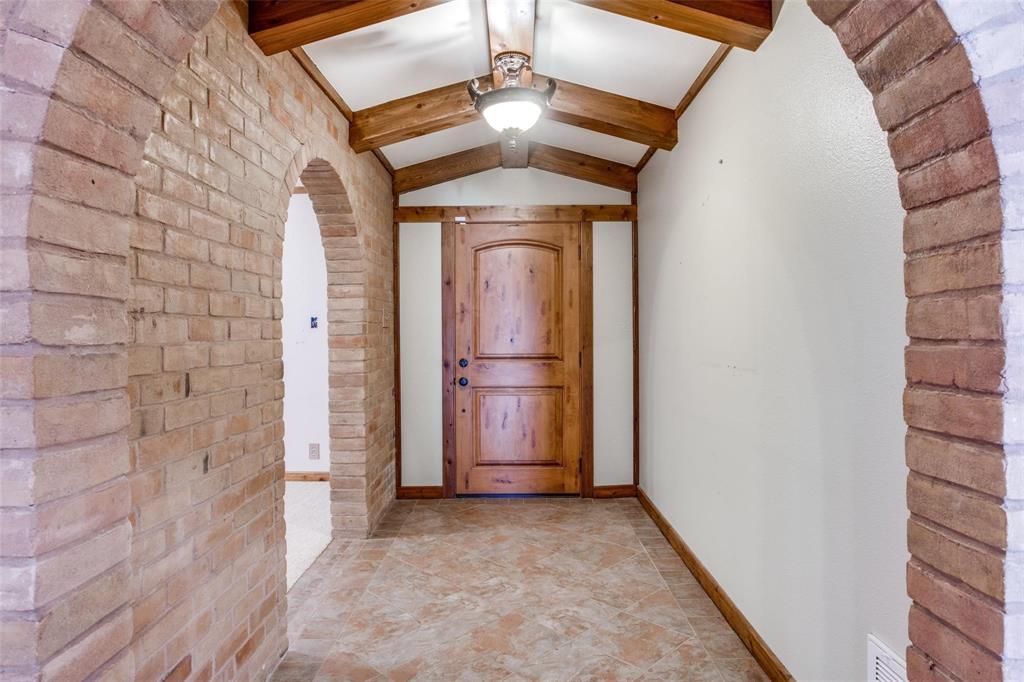 9470 S Highway Pilot Point, TX 76258 - Photo 2 of 26 a view of a hallway with a door