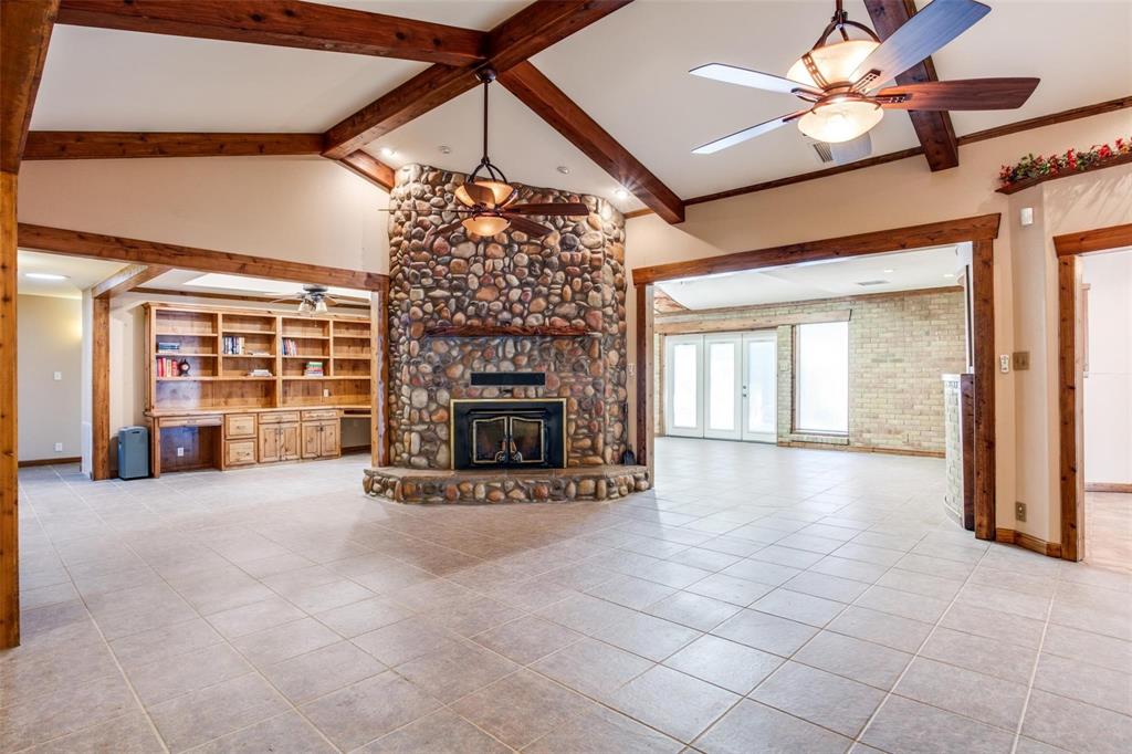 9470 S Highway Pilot Point, TX 76258 - Photo 3 of 26 a view of a livingroom with a fireplace and window