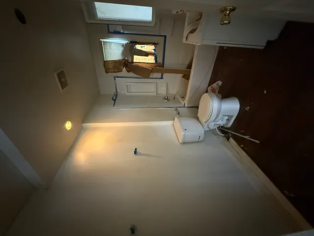 a view of empty room with windows