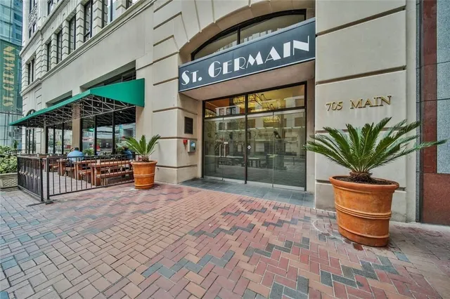 a outdoor living space with furniture and a potted plant