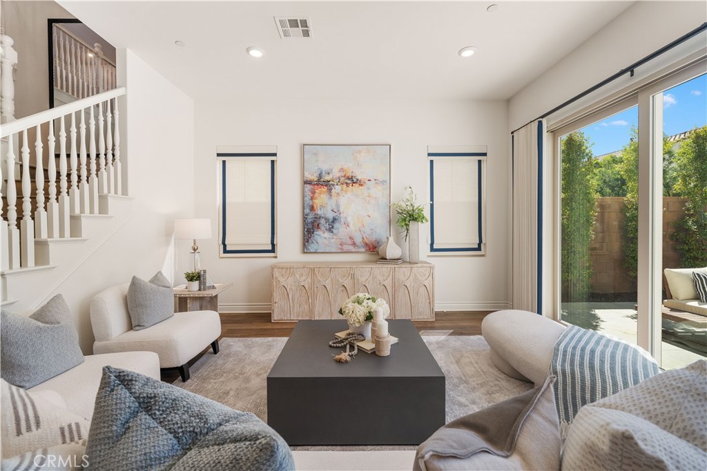 143 Ceremony Irvine, CA 92618 - Photo 11 of 74 a living room with furniture and a large window