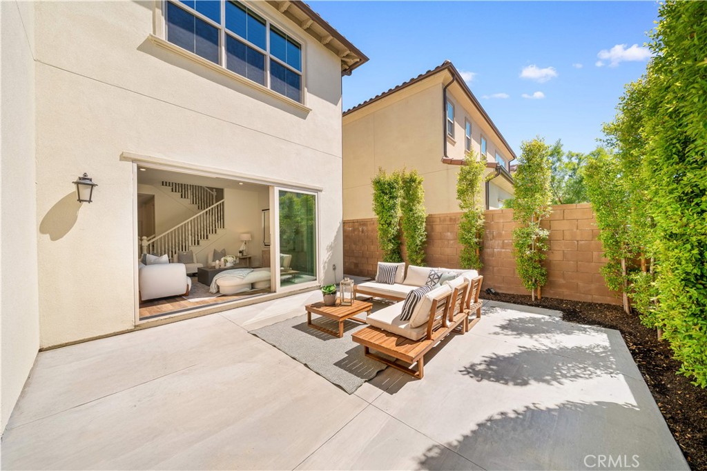 143 Ceremony Irvine, CA 92618 - Photo 24 of 74 a building outdoor space with patio furniture and potted plants