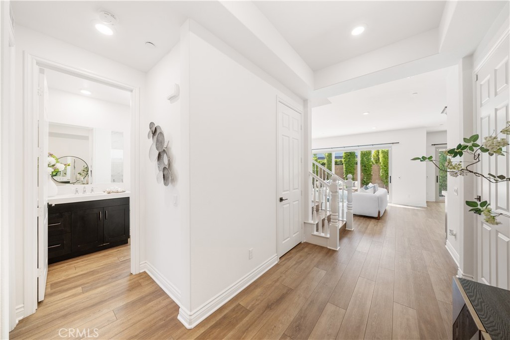 143 Ceremony Irvine, CA 92618 - Photo 28 of 74 a view of a livingroom with furniture wooden floor and a chandelier
