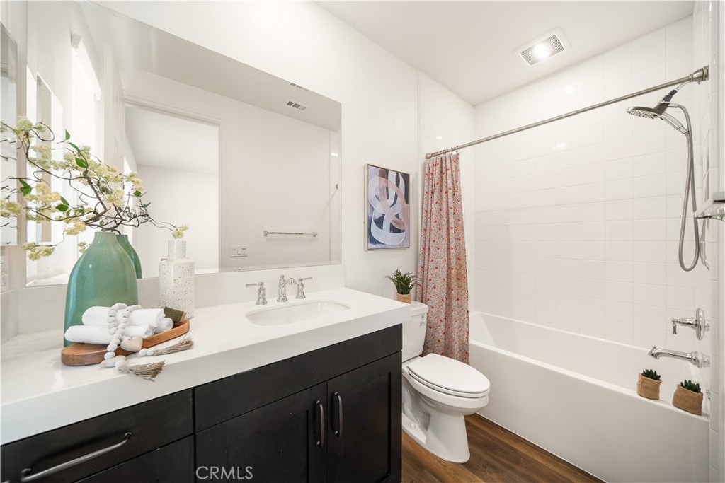 143 Ceremony Irvine, CA 92618 - Photo 42 of 74 a bathroom with a sink a toilet and shower