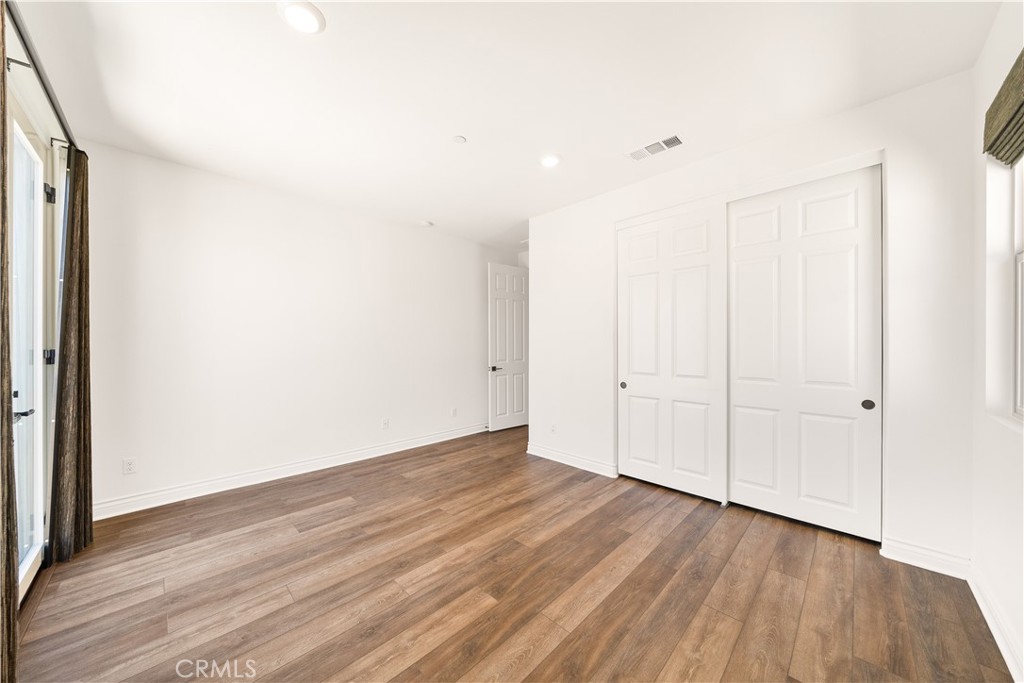 143 Ceremony Irvine, CA 92618 - Photo 44 of 74 a view of a room with wooden floor