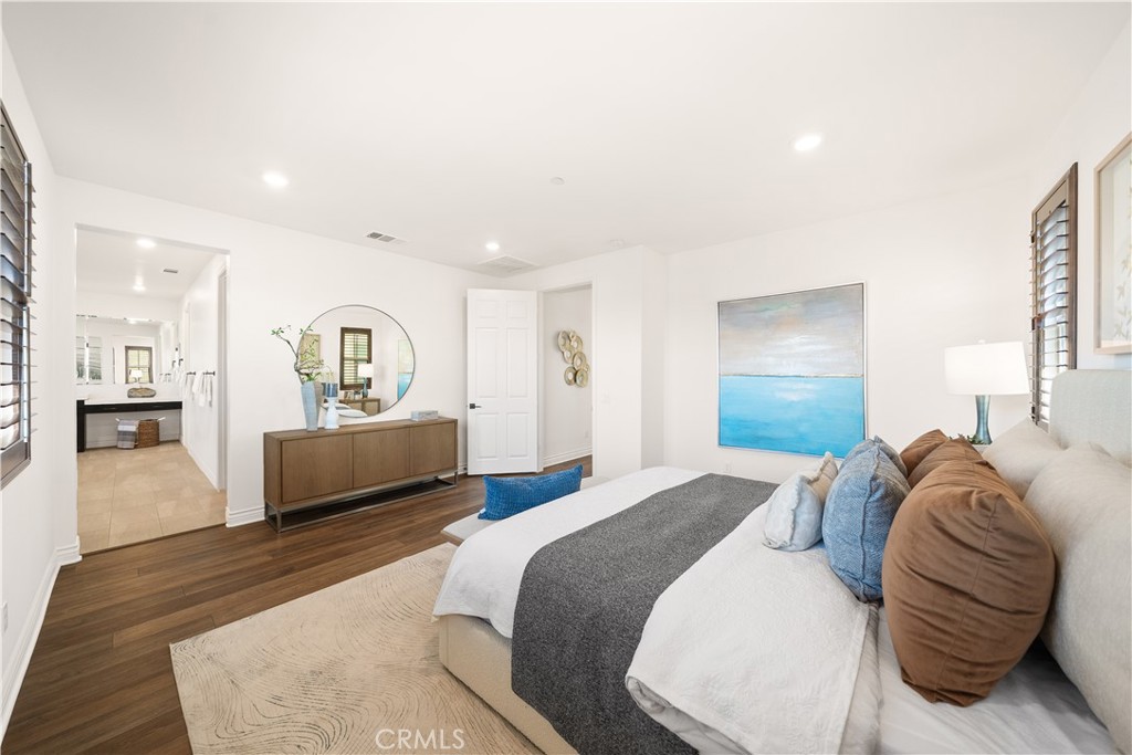 143 Ceremony Irvine, CA 92618 - Photo 48 of 74 a bedroom with a bed and a view of kitchen