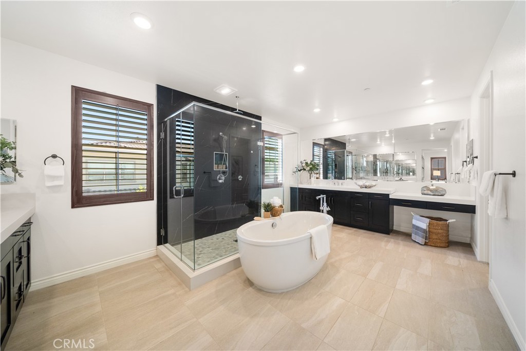 143 Ceremony Irvine, CA 92618 - Photo 49 of 74 a large room with a large window and stainless steel appliances