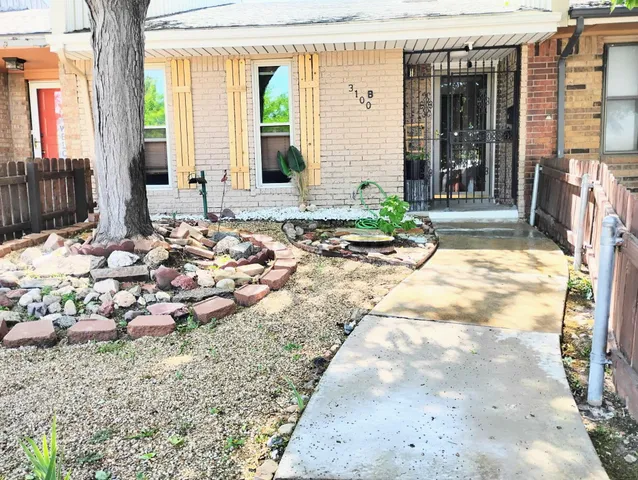 a view of a lounge chair in front of building