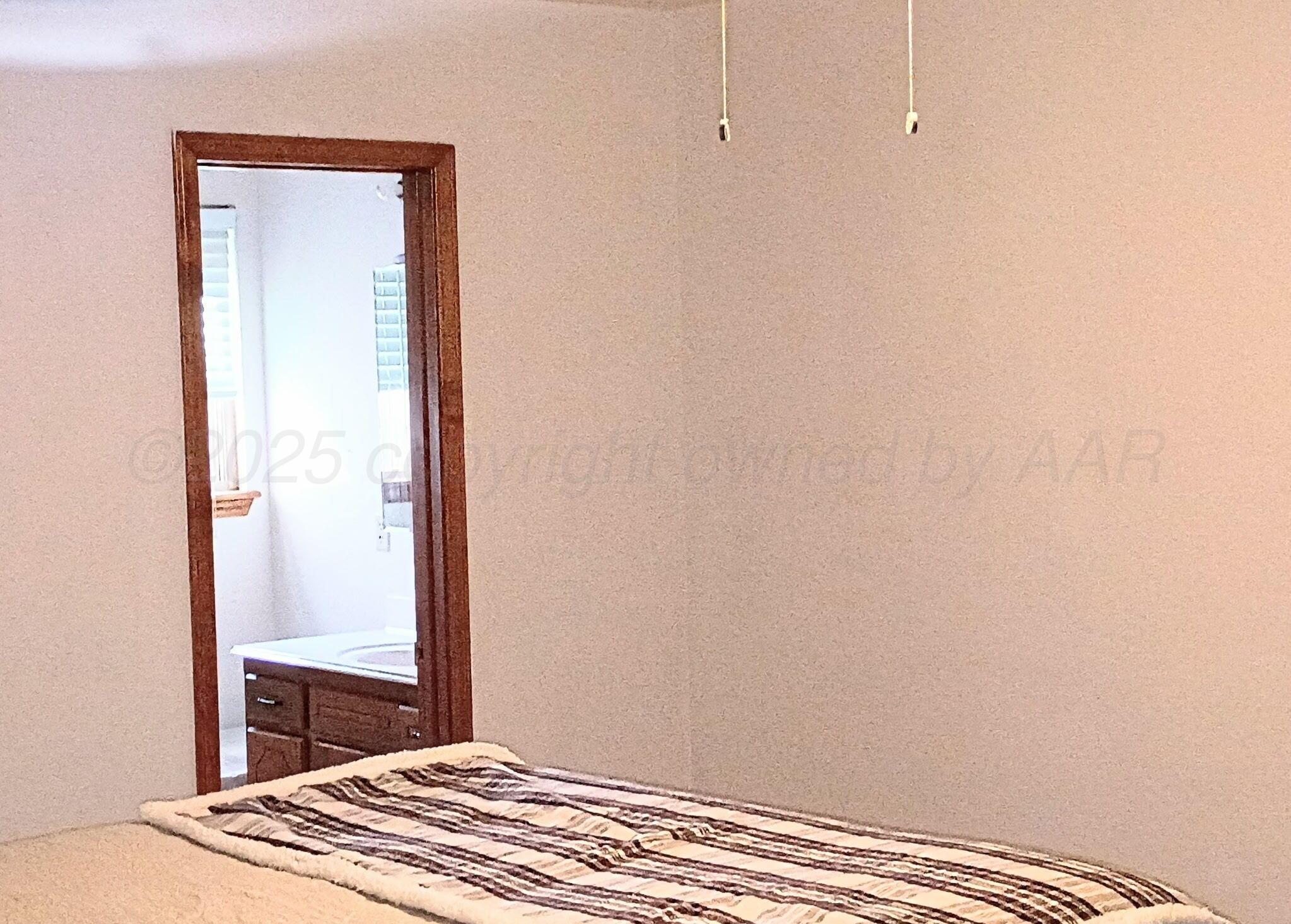 3100 Janet Drive Amarillo, TX 79109 - Photo 14 of 22 a view of bedroom and bathroom