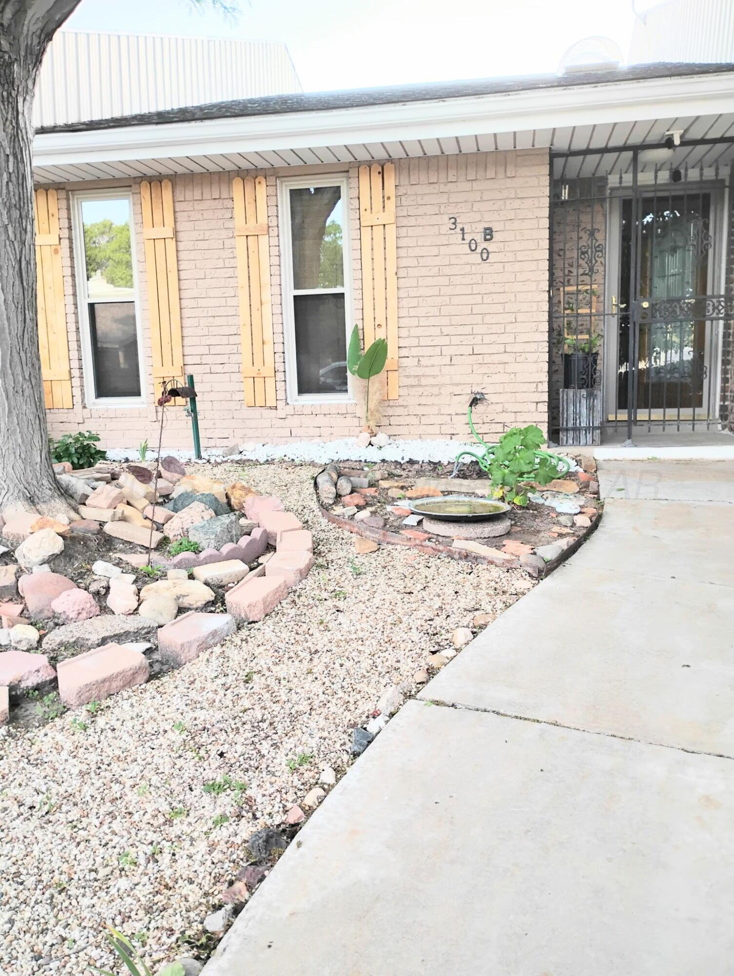 3100 Janet Drive Amarillo, TX 79109 - Photo 2 of 22 a front view of a house