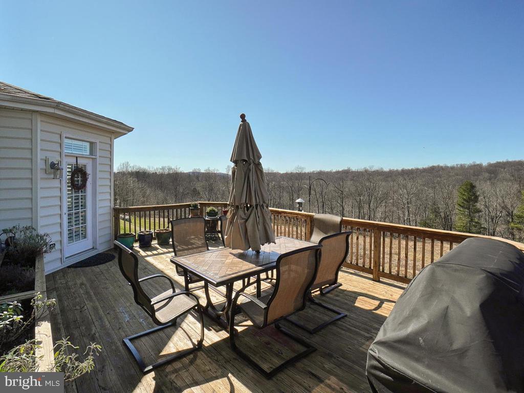 11018 Country Club Road New Market, MD 21774 - Photo 34 of 41 Enjoy meals on the deck in the summer.