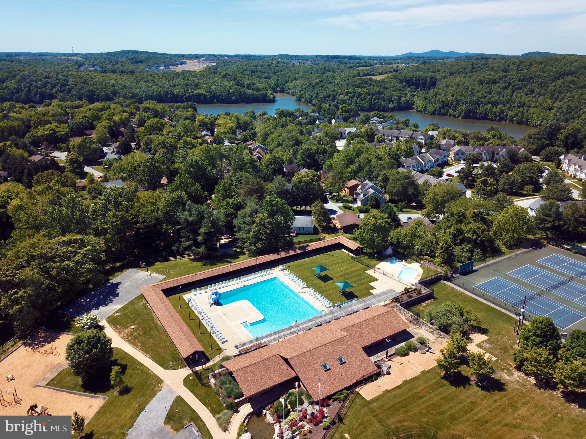 11018 Country Club Road New Market, MD 21774 - Photo 40 of 41 Enjoy summer dayas at the pool.