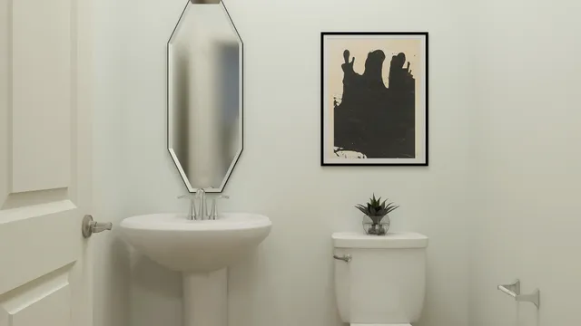 a bathroom with a sink and mirror