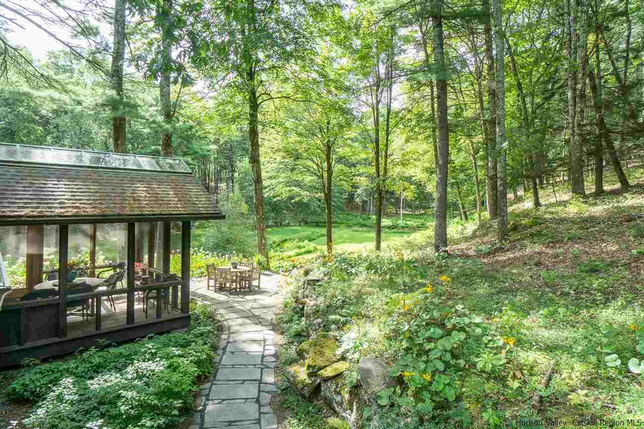 45 Pratt Road Stone Ridge, NY 12484 - Photo 12 of 35 a view of a house with backyard and sitting area