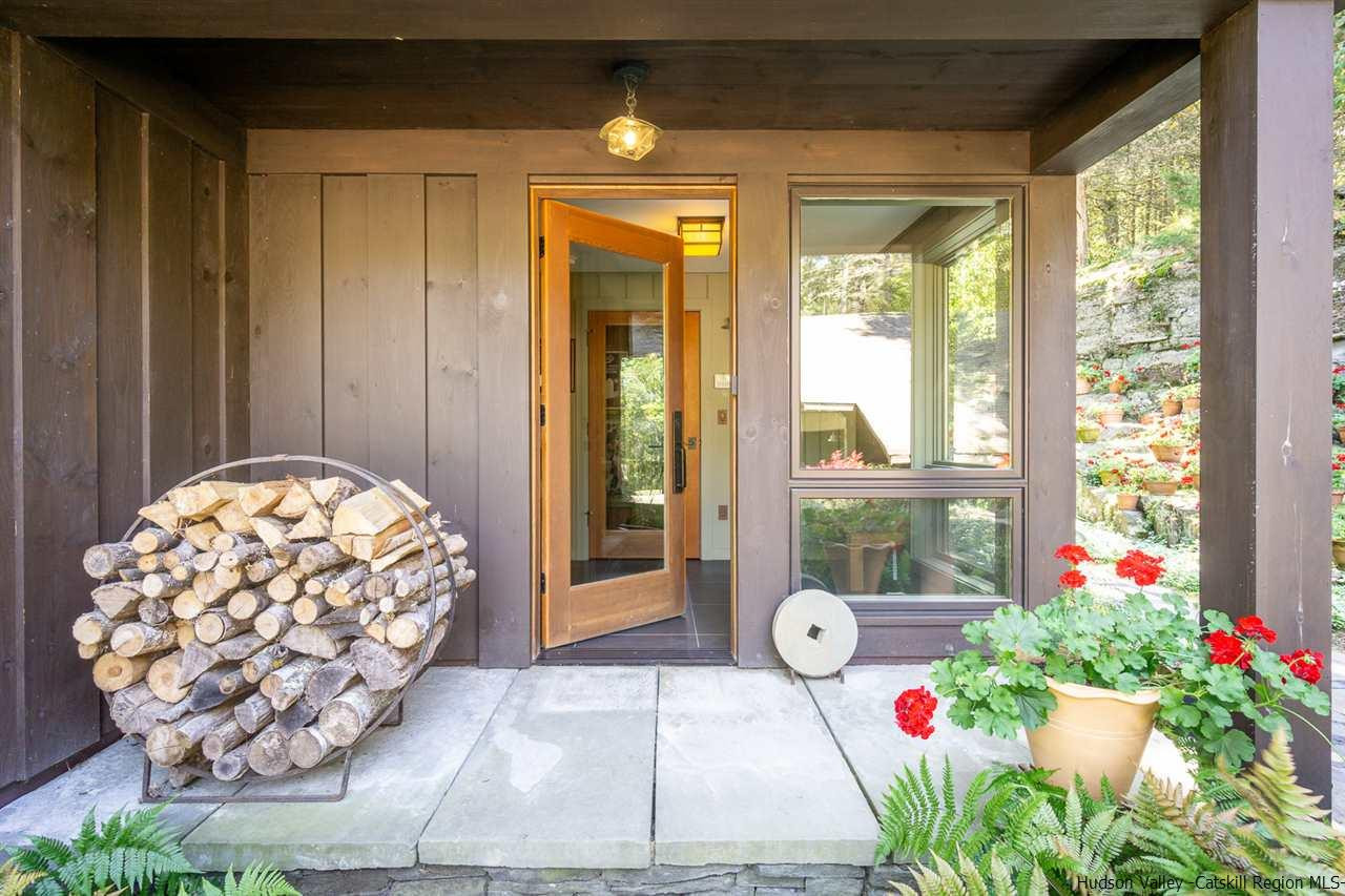 45 Pratt Road Stone Ridge, NY 12484 - Photo 18 of 35 a very nice looking dining room with a large window and chandelier