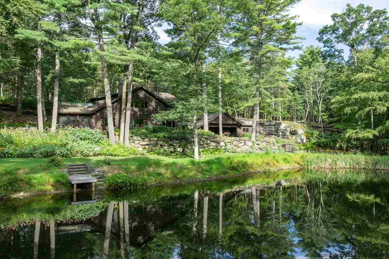 45 Pratt Road Stone Ridge, NY 12484 - Photo 2 of 35 a backyard of a house with lots of green space and plants