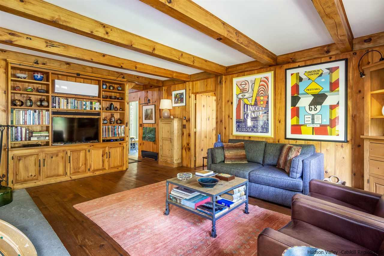 45 Pratt Road Stone Ridge, NY 12484 - Photo 21 of 35 a living room with furniture and a flat screen tv