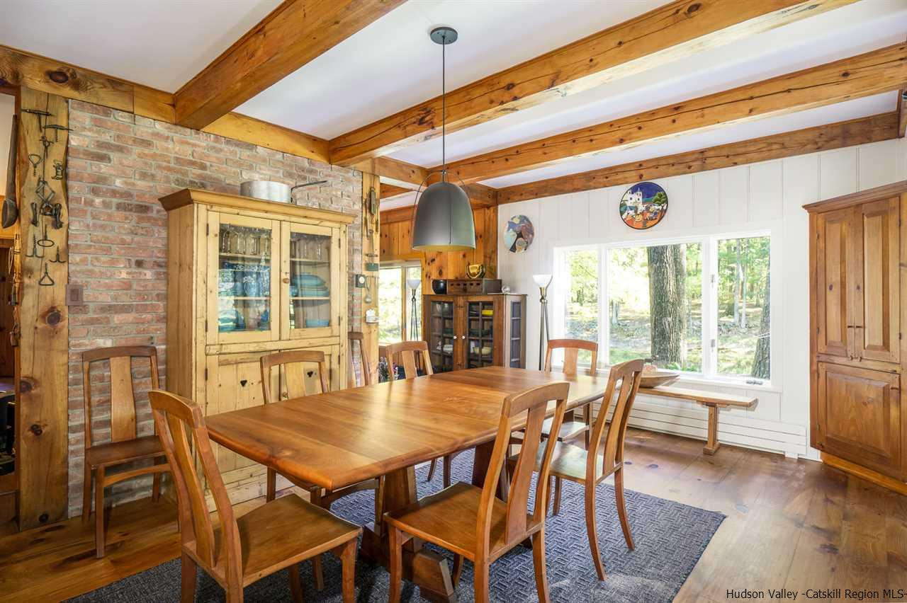 45 Pratt Road Stone Ridge, NY 12484 - Photo 22 of 35 a dining room with furniture and wooden floor
