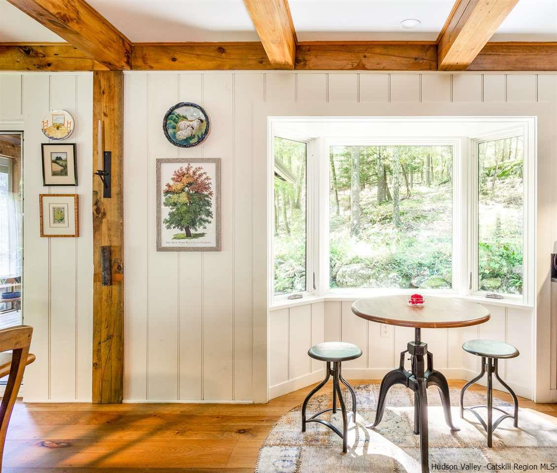 45 Pratt Road Stone Ridge, NY 12484 - Photo 24 of 35 a dining room with a table and a table