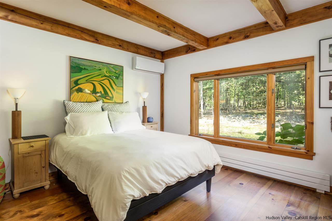 45 Pratt Road Stone Ridge, NY 12484 - Photo 29 of 35 a bedroom with a bed and a window