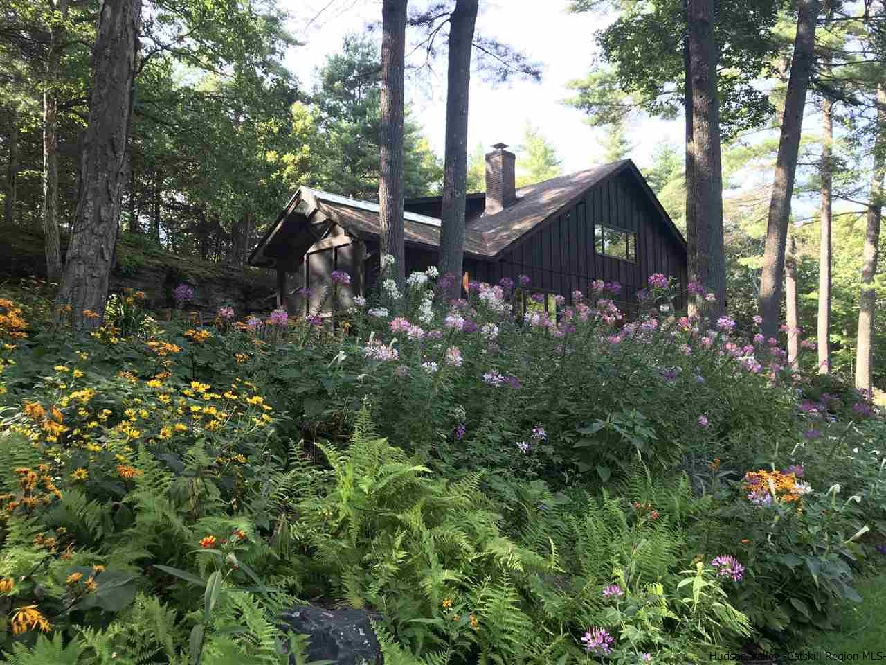 45 Pratt Road Stone Ridge, NY 12484 - Photo 3 of 35 a view of a house with a tree and sitting area