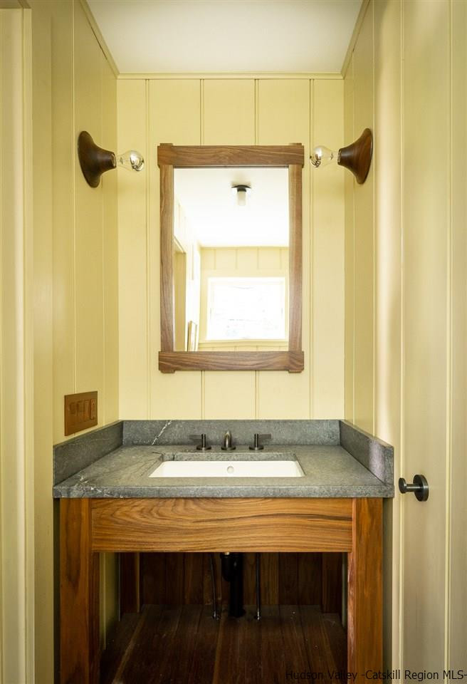 45 Pratt Road Stone Ridge, NY 12484 - Photo 31 of 35 a bathroom with a granite countertop sink and a mirror