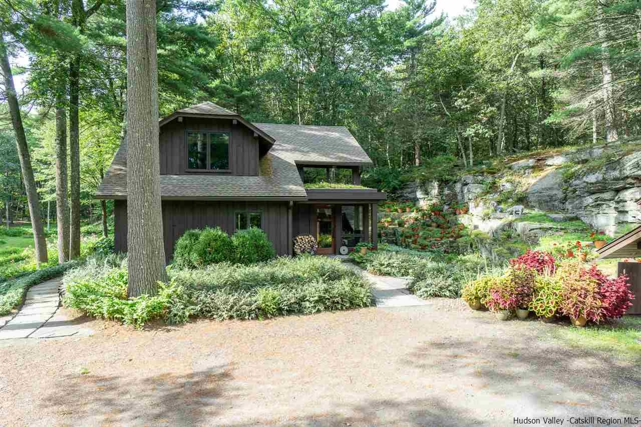 45 Pratt Road Stone Ridge, NY 12484 - Photo 6 of 35 a front view of a house with a garden