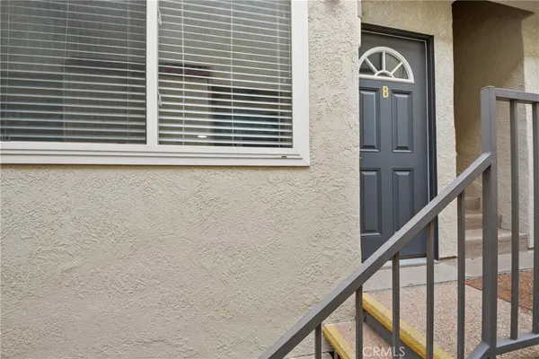 a view of a balcony and door