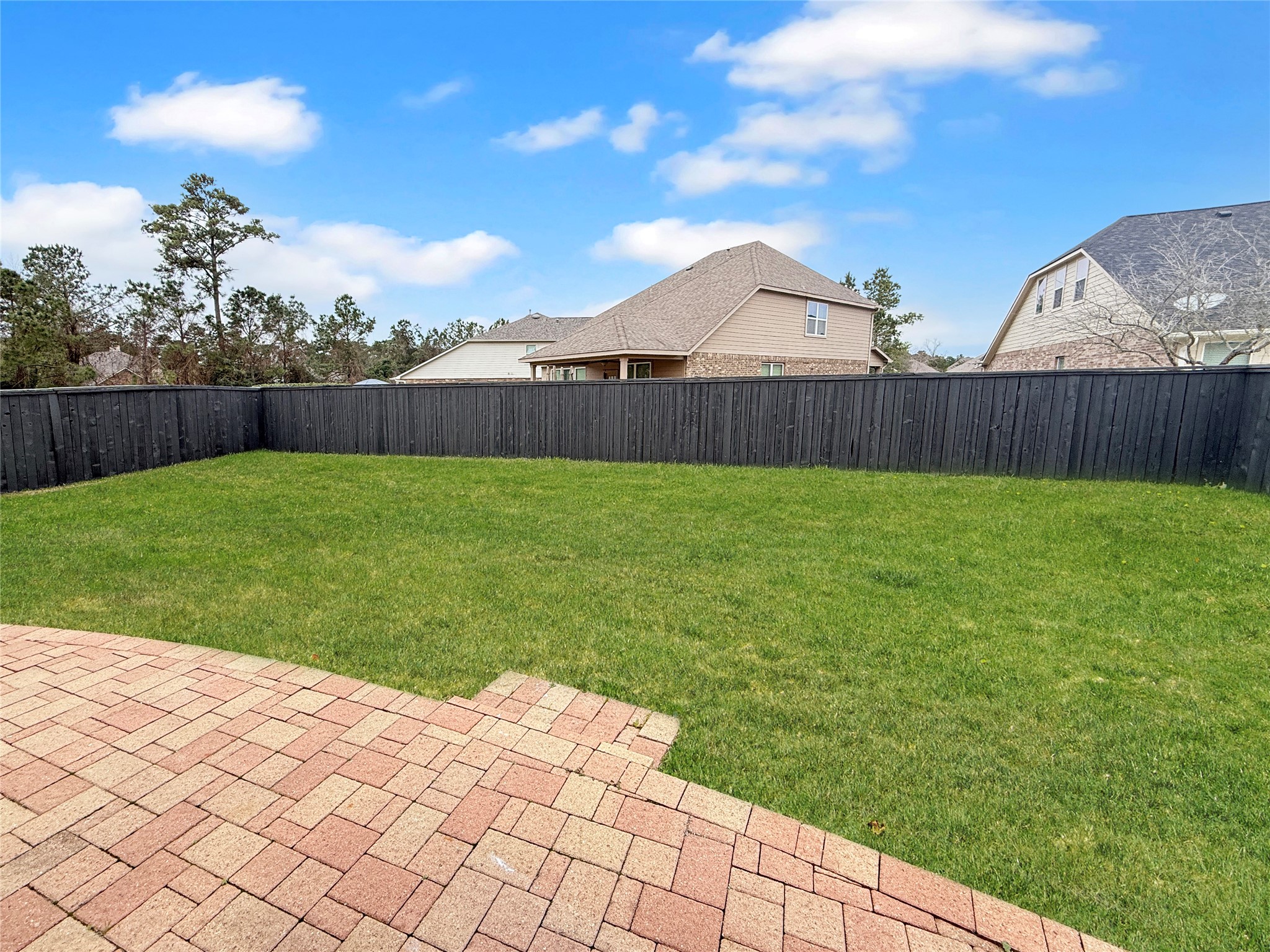 34 Hearthwick Road Tomball, TX 77375 - Photo 15 of 32 View of the backyard