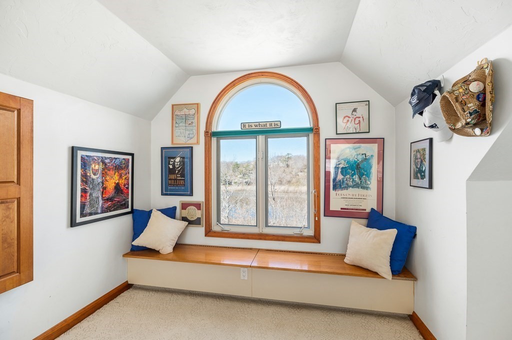 129 Thatcher Road Gloucester, MA 01930 - Photo 21 of 31 a living room with furniture and a large window